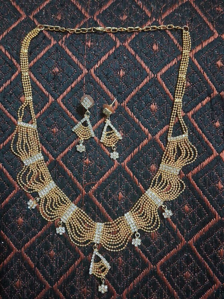 Golden Multi Chain Model Jewellery Set