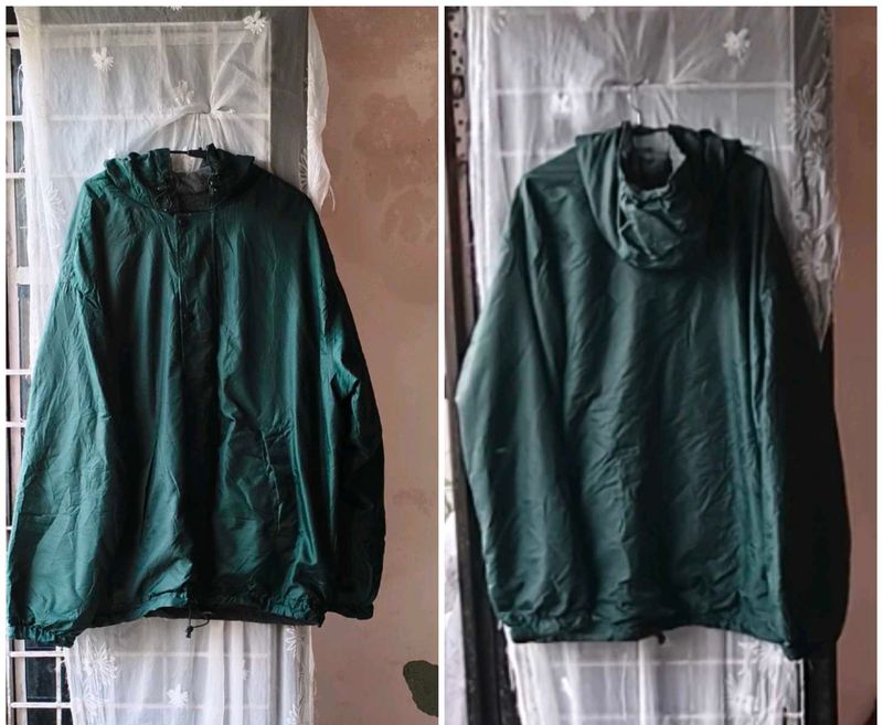 Green hooded windbreaker
