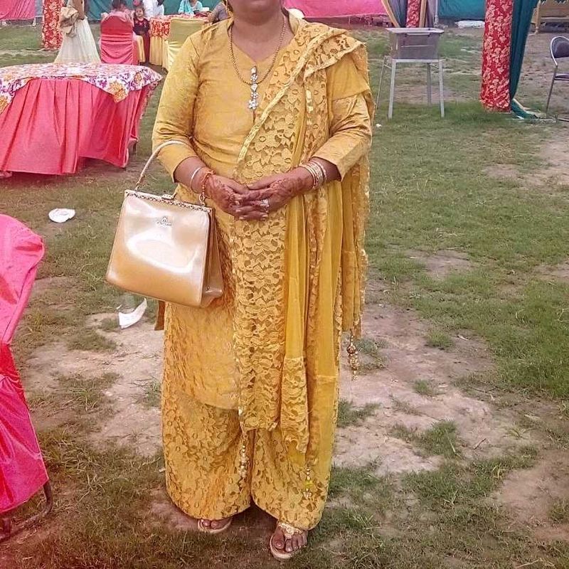 Golden Brocade kurta and net plazo with dupatta