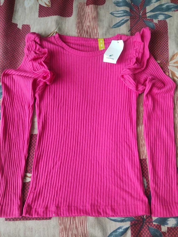Pink solid ruffle top from Zudio