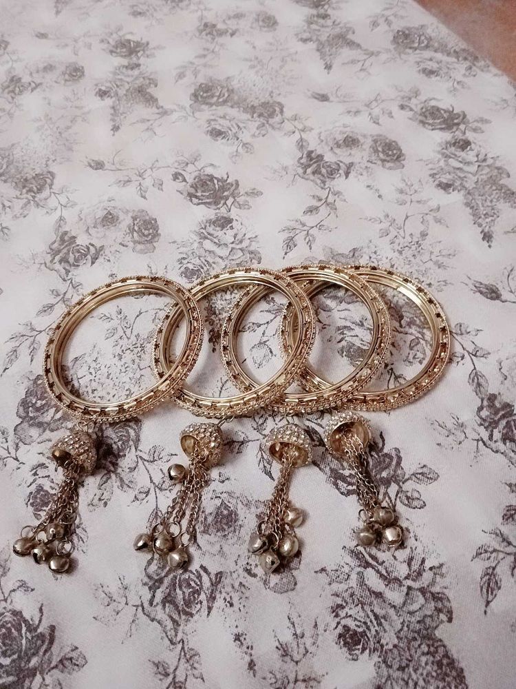 Golden Bangles with Dangling Charms