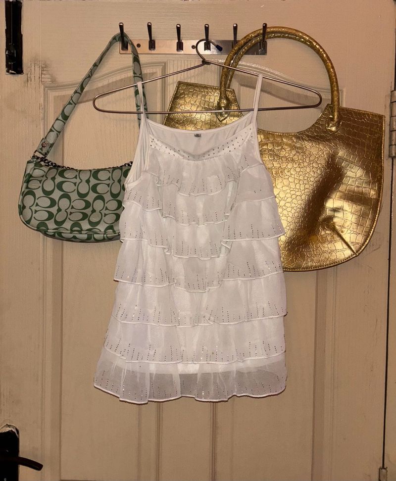 ⊹₊⟡⋆ y2k ruffled chatpata top with stones ⟡ ݁₊ .