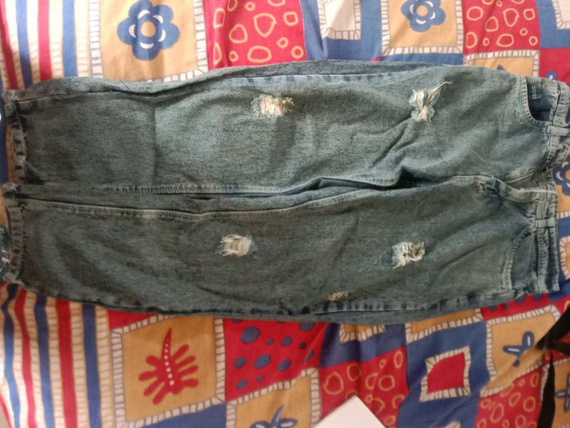 Ripped Blue Denim Jeans