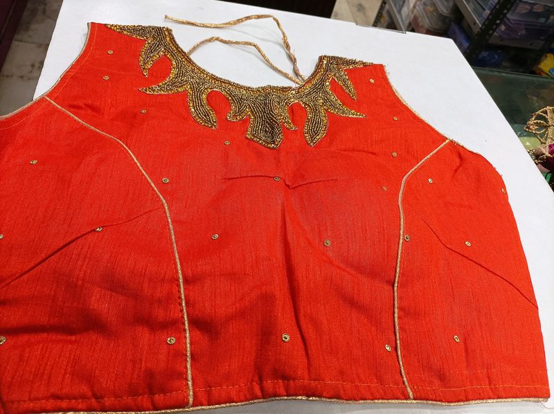 Orange Colour Blouse With Sleeves Inside...