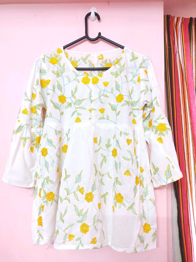 White Top With Yellow And Light Blue Embroidery