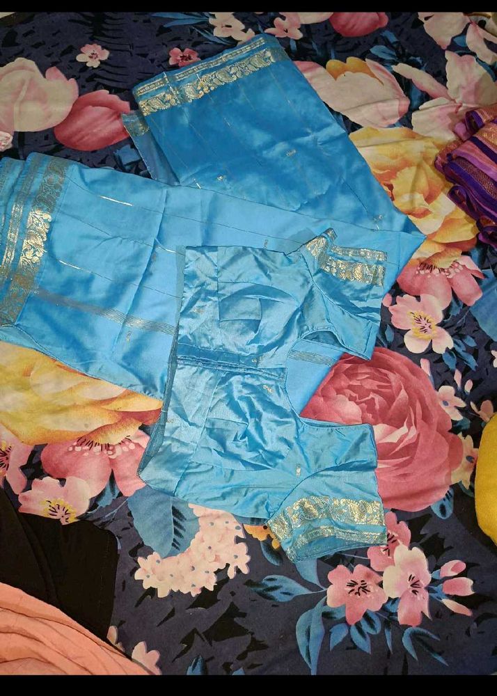 Woman Silk saree with stitched blouse