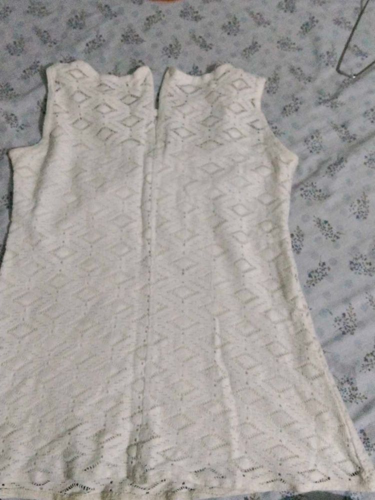 White Sleeveless Top