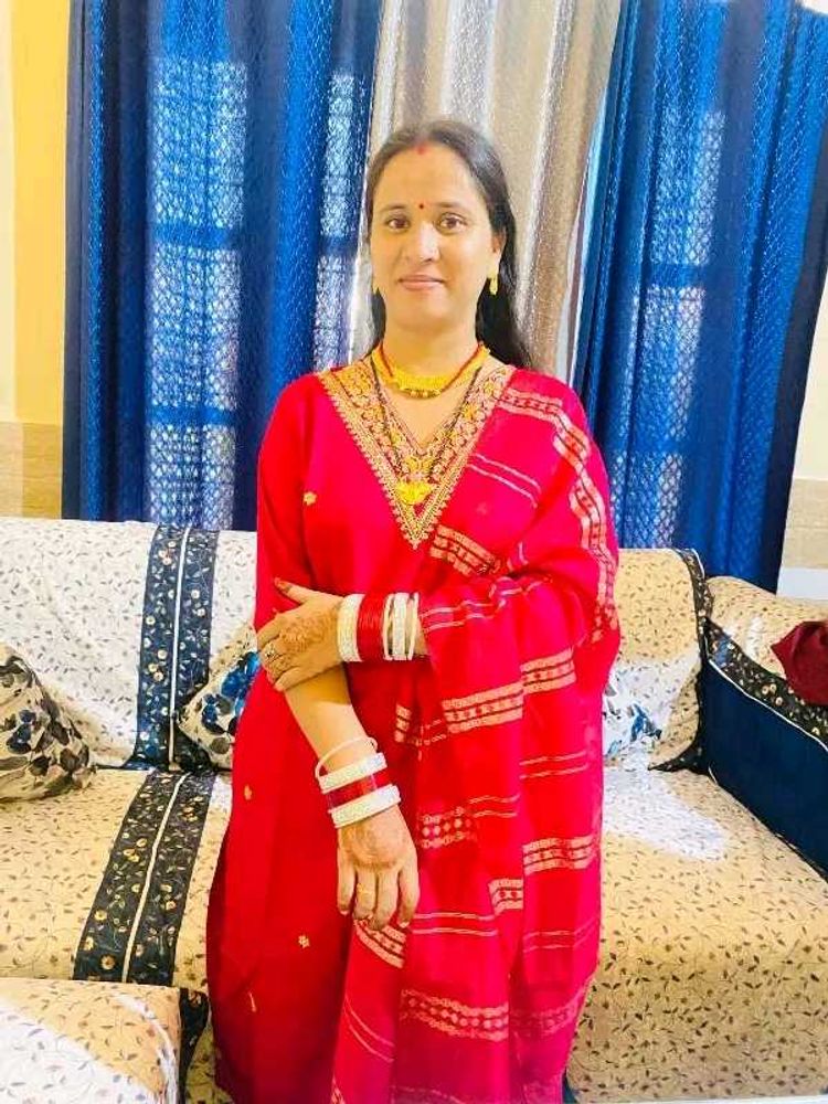 Elegant Red Saree with Gold Details