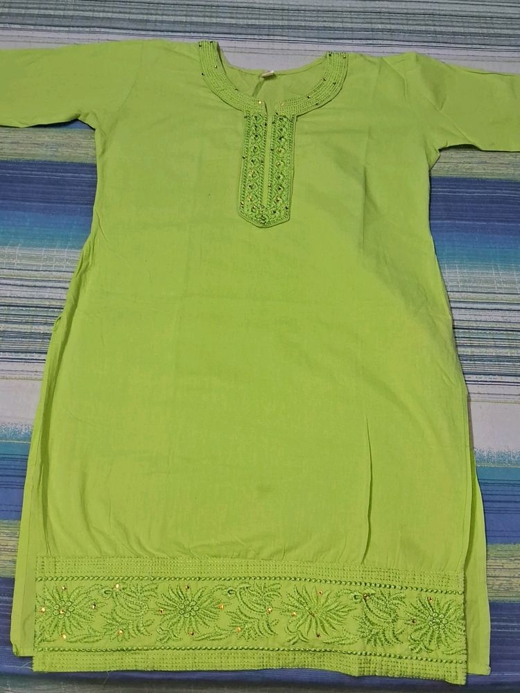 A Green Kurti With Embroidery