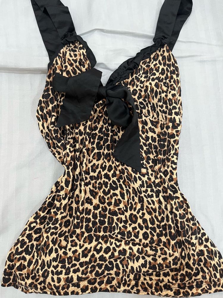 Y2K animal printed top with a cute black bow