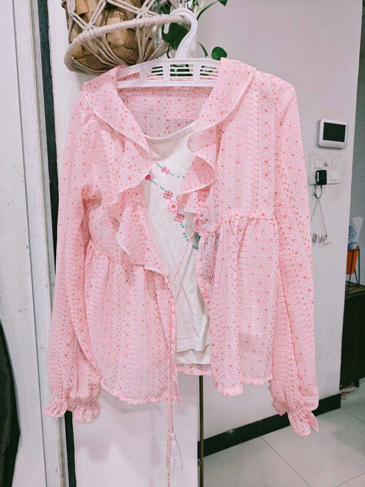 Pink Ruffle Sheer Top and Jeans
