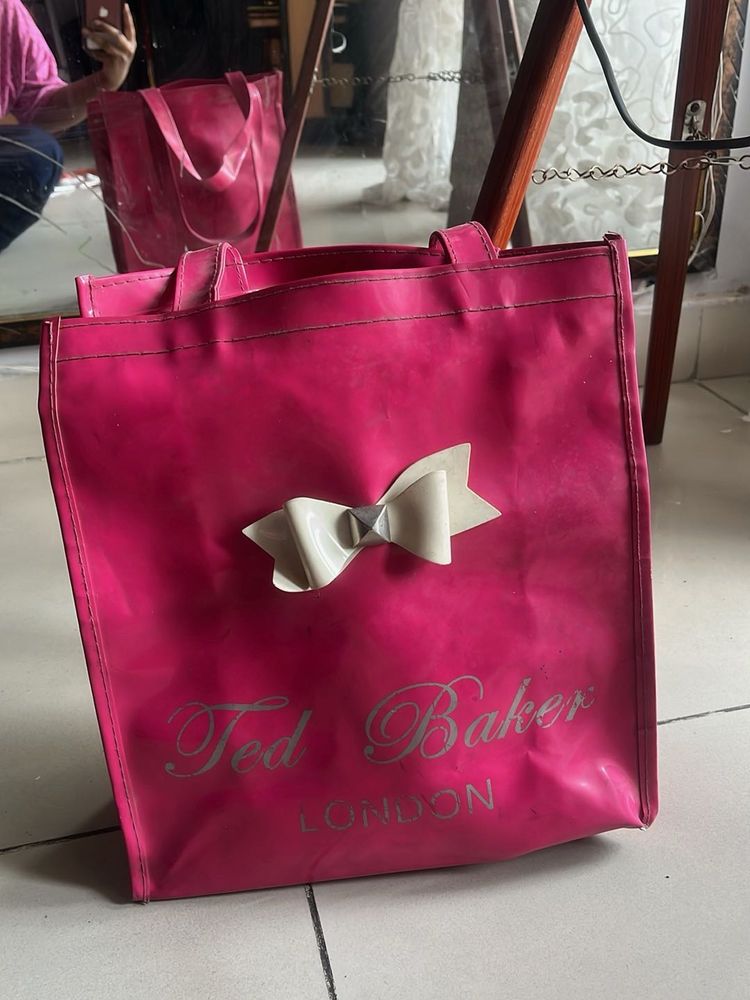 pink hand bag