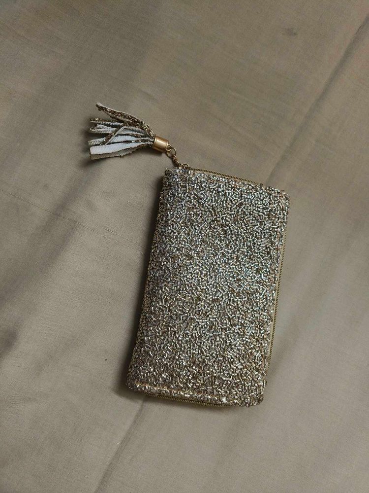 Sequence Golden Clutch