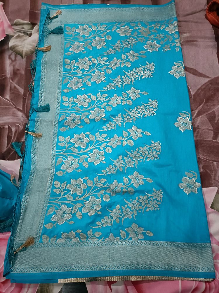 Blue Saree With Silver Print And Border