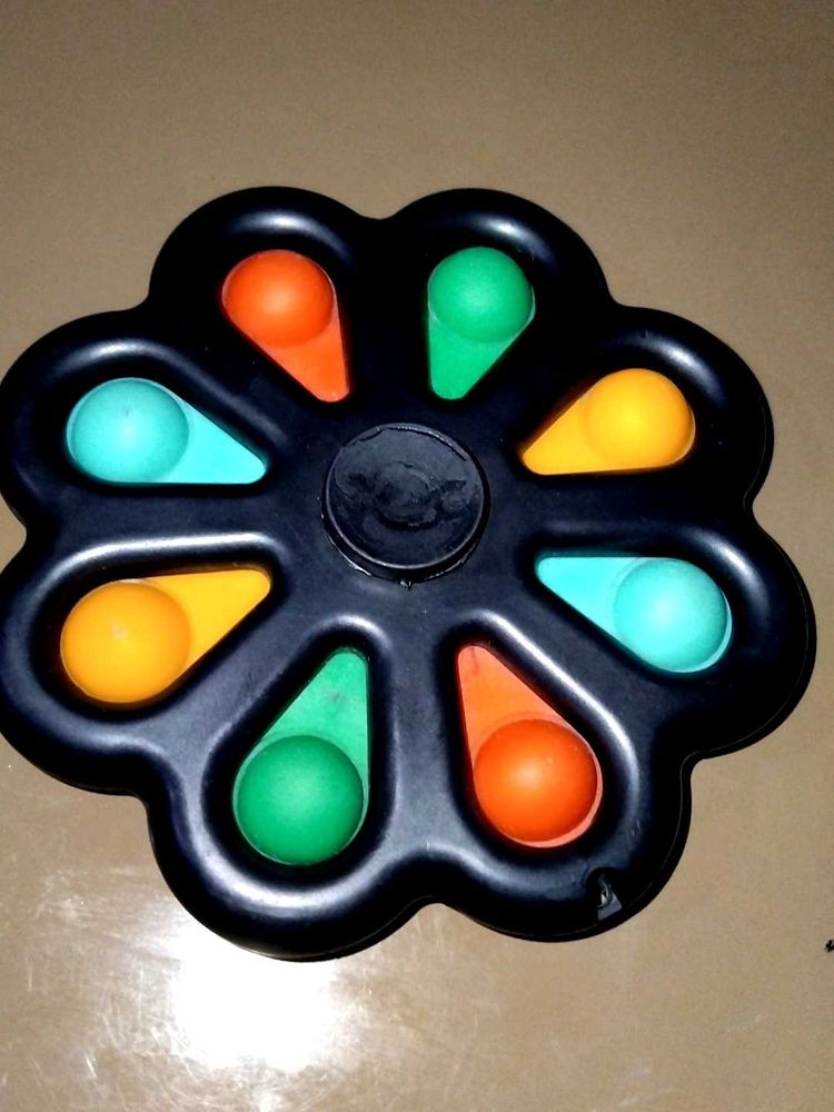 Simple Dimple Spinner Toy