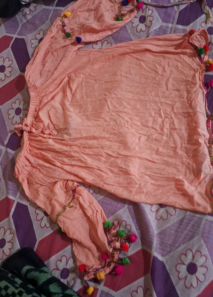 Peach Top with Pom-Pom Detail