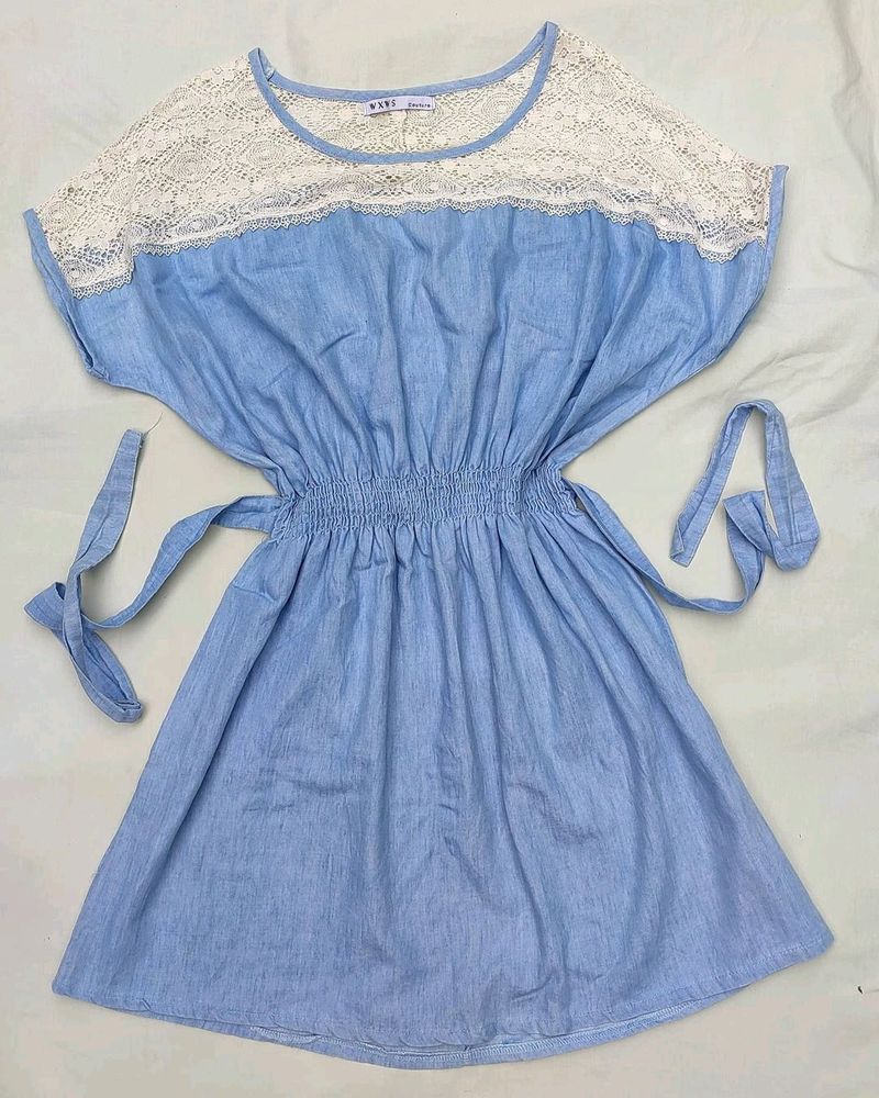 Blue dress net detailing with self tie at back