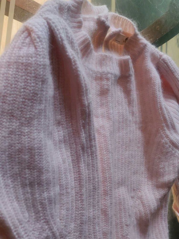 light pink sweater for cozy winters.