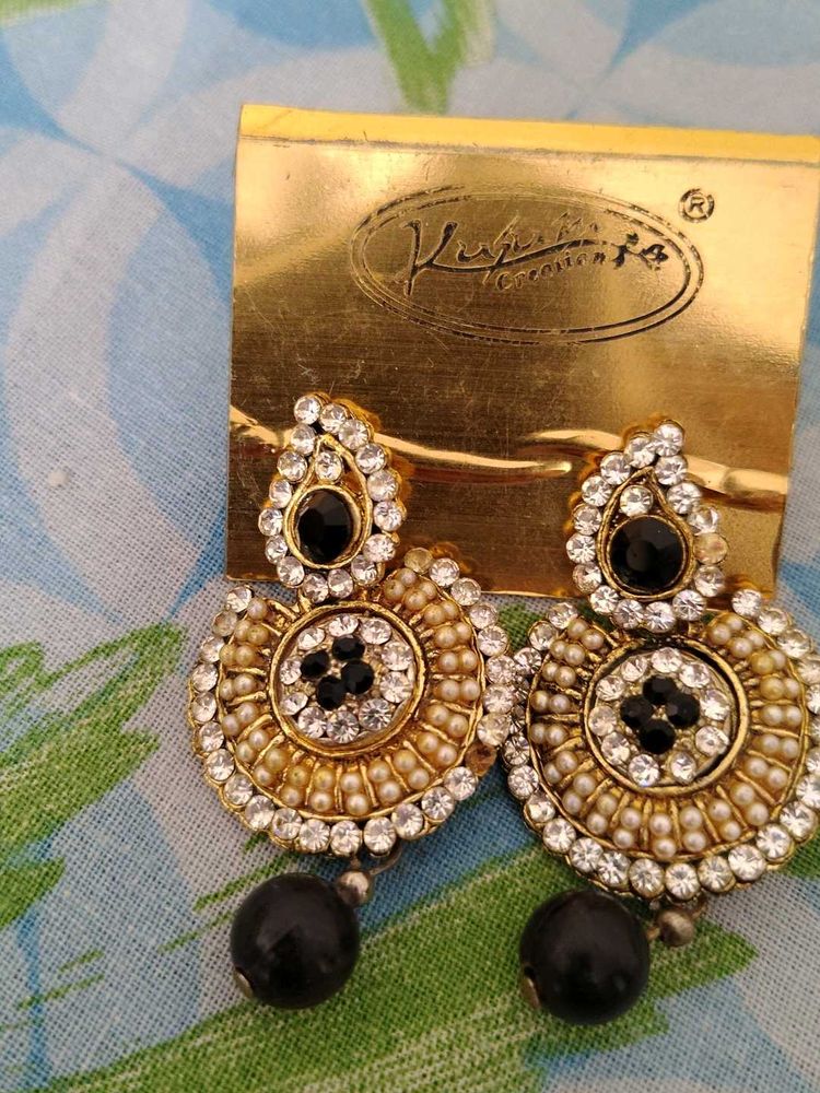 Elegant Earrings used