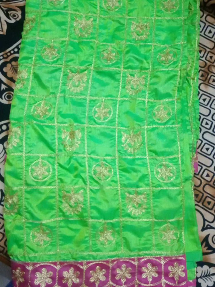 Green Saree with Pink Lace Border