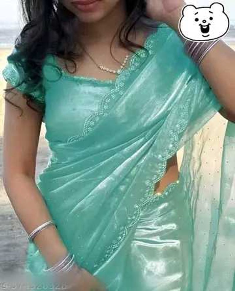 Elegant Teal Saree suitable for parties..