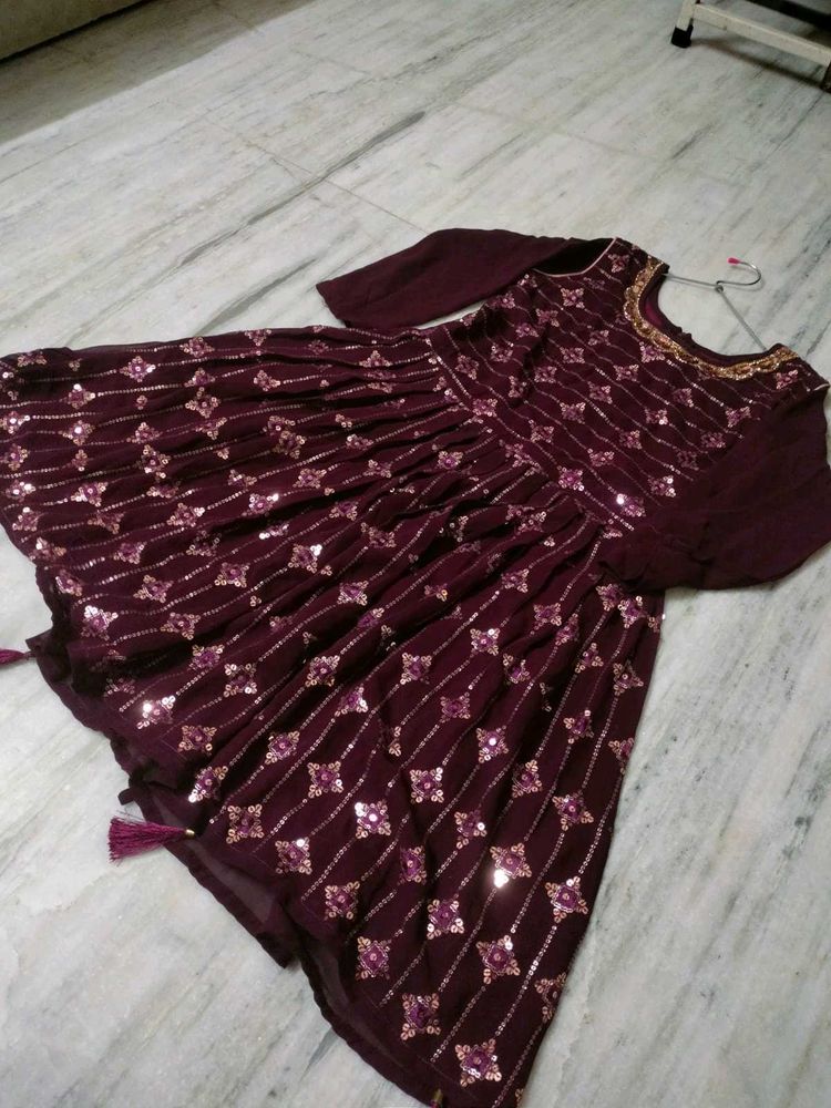 A Beautiful Women Festive Wear Wine Sharara