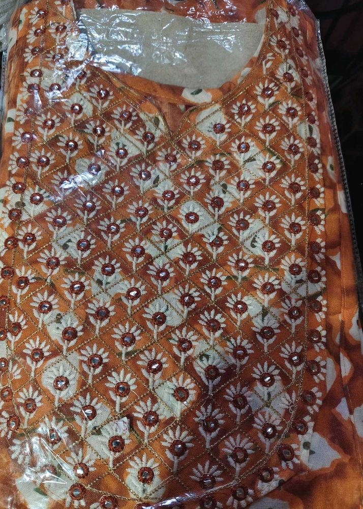 🆕 Naira Cut Orange Embroidered Kurti