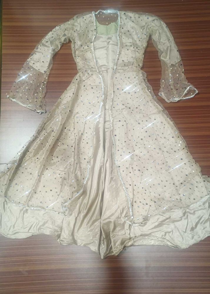 brown gown with net shrug
