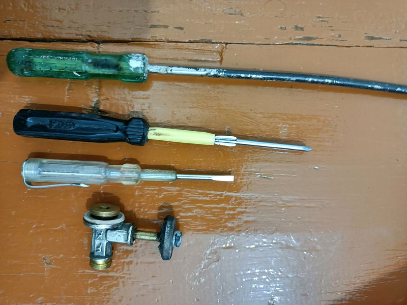3 Different Size Screwdrivers And Joint