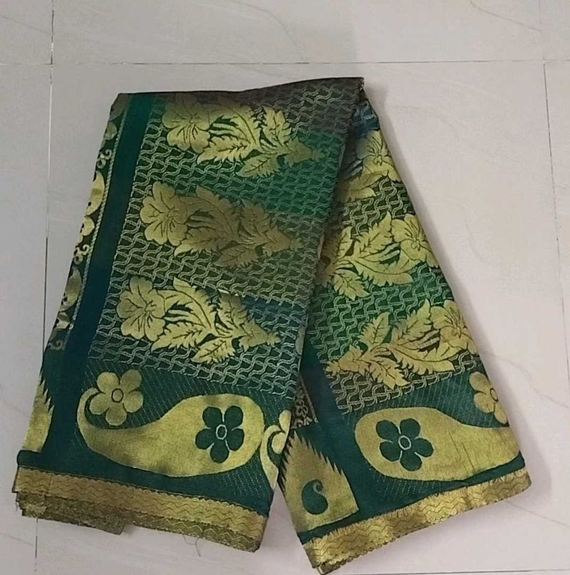 Unused Festive Wear Dark  Green Saree With Gold