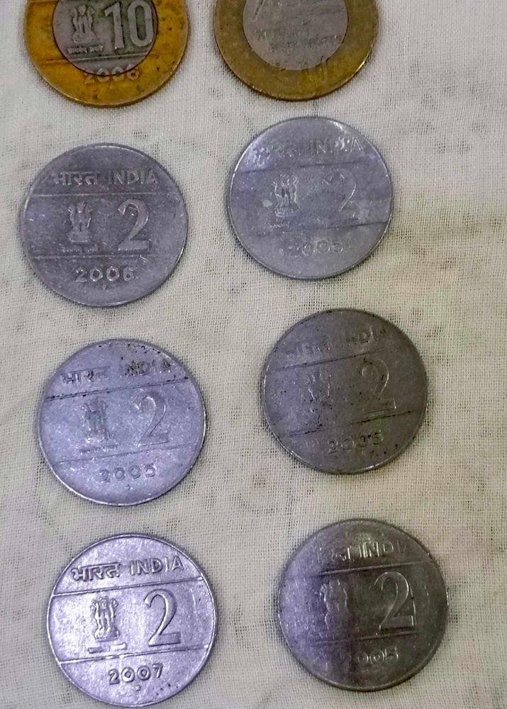 Cross Coin 2 Rupee And 10 Ruppee