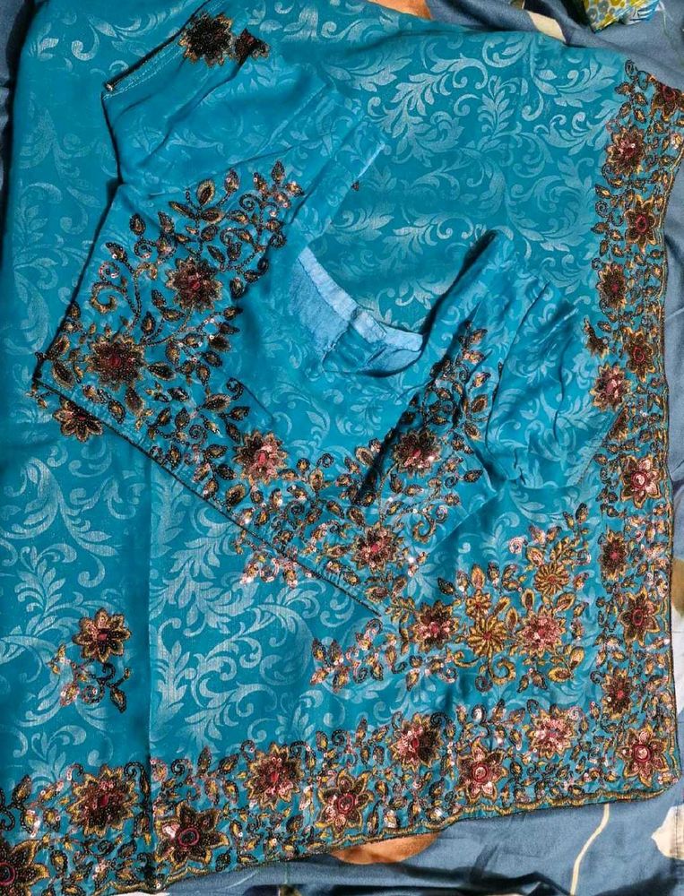party wear saree with blouse.