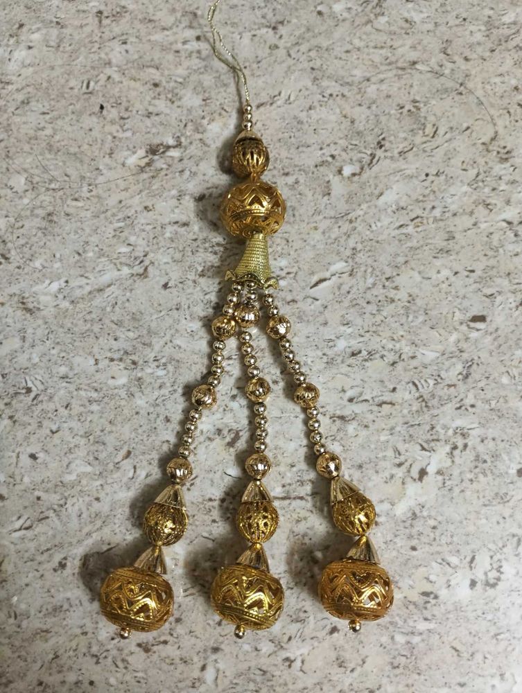 Golden Beaded Indian Tassel