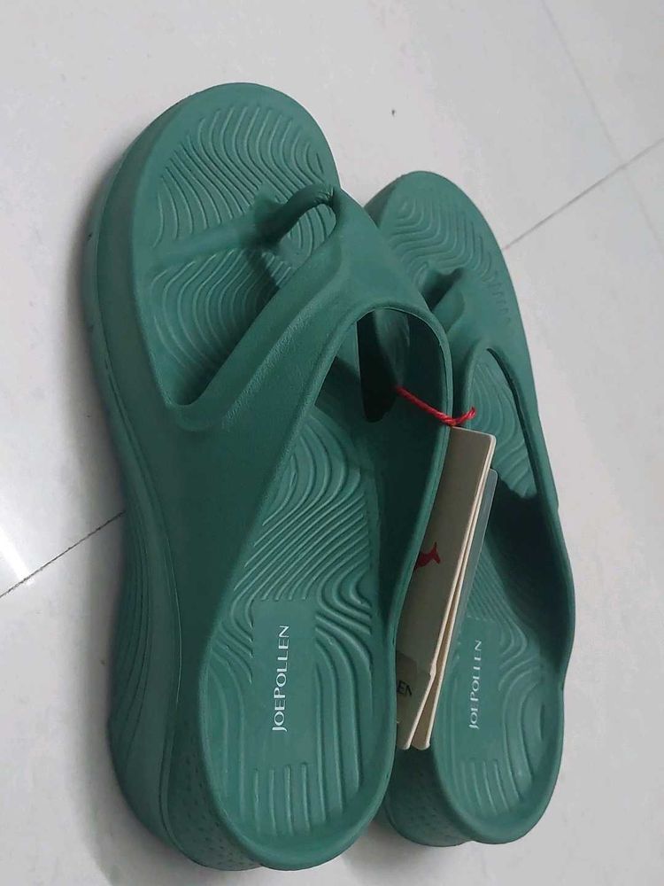 Branded Green flip-flops