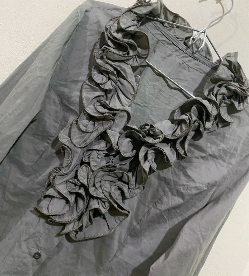Fancy Top With Ruffle Neck Detailing Nd Buttons