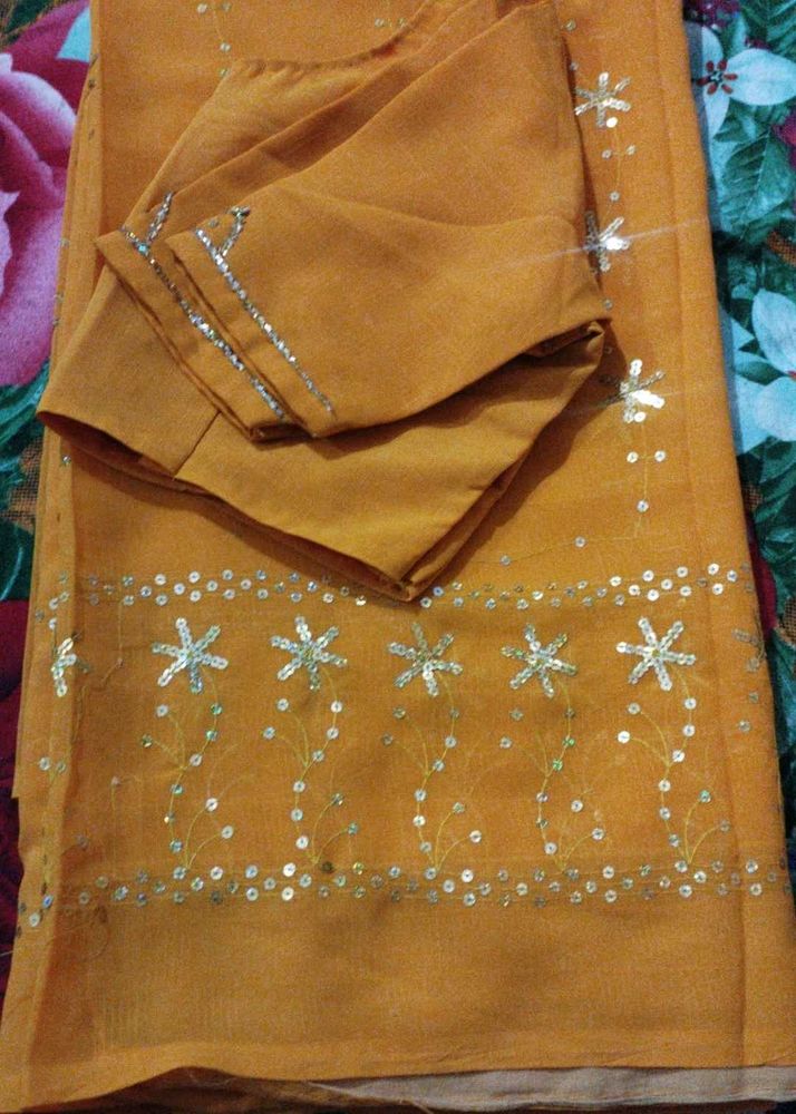 yellow sequins saree