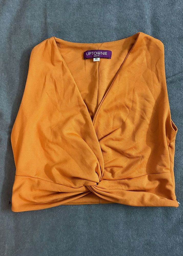 Uptownie Orange Twist Front Crop Top