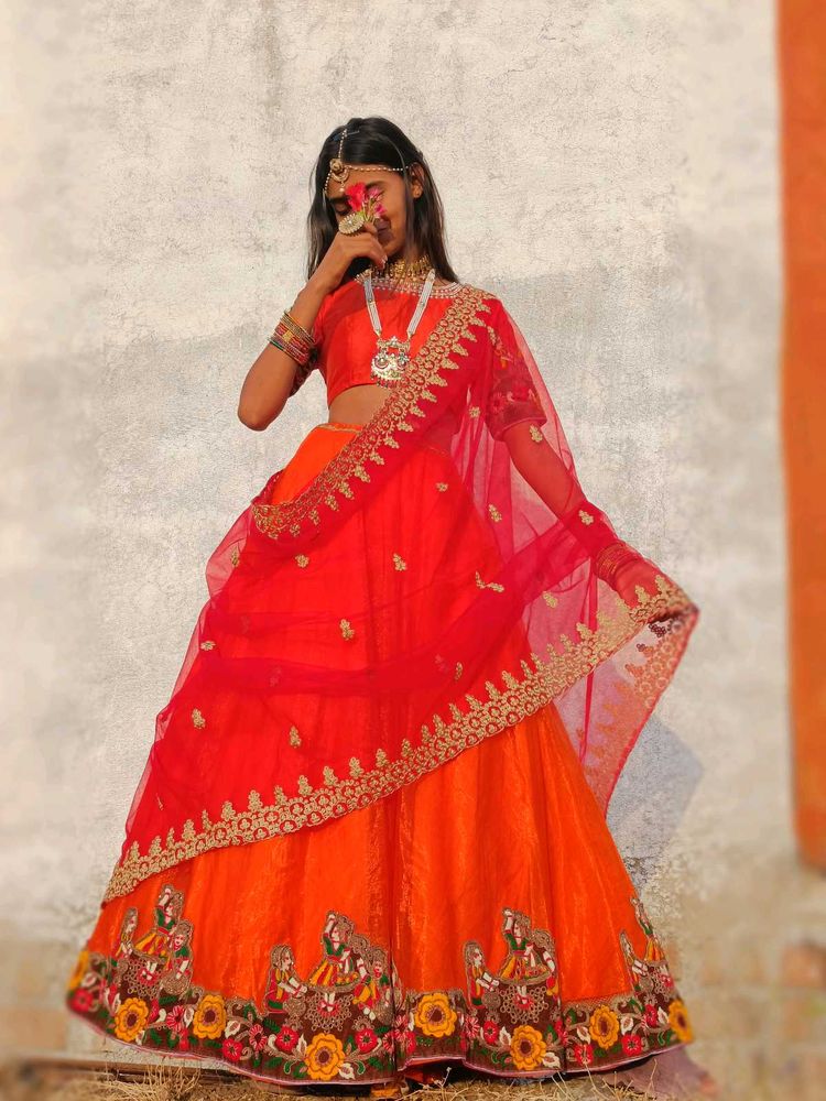 Orange Lehanga With Kathiyawadi Lace
