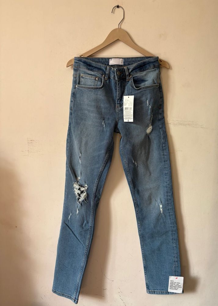 Distressed Denim Jeans