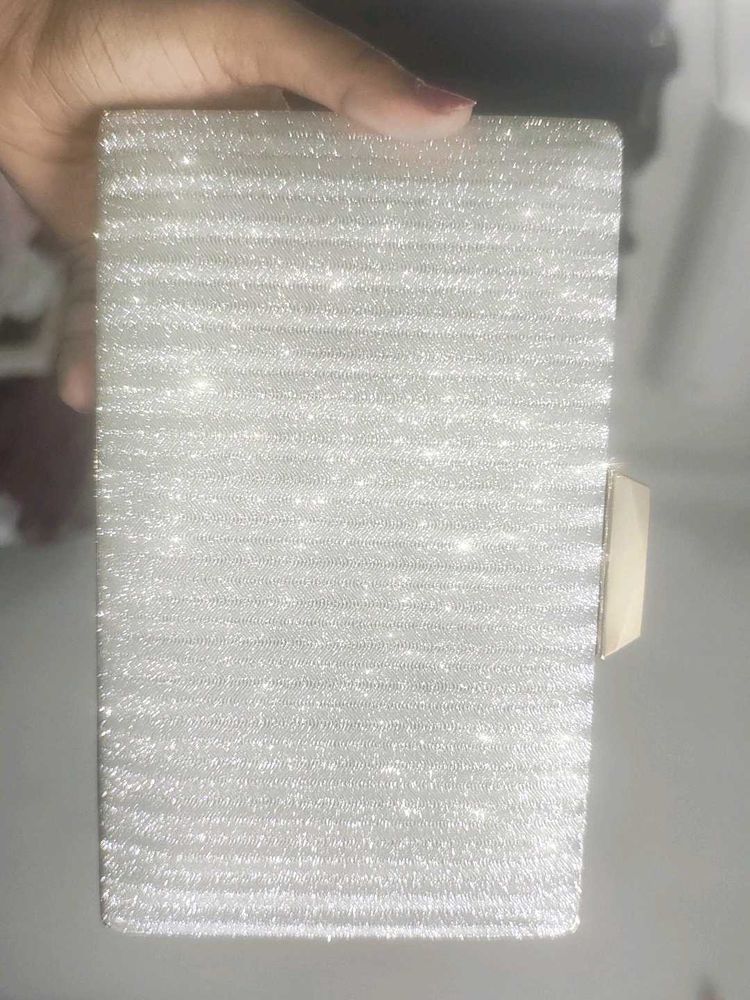 beautiful silver clutch bag