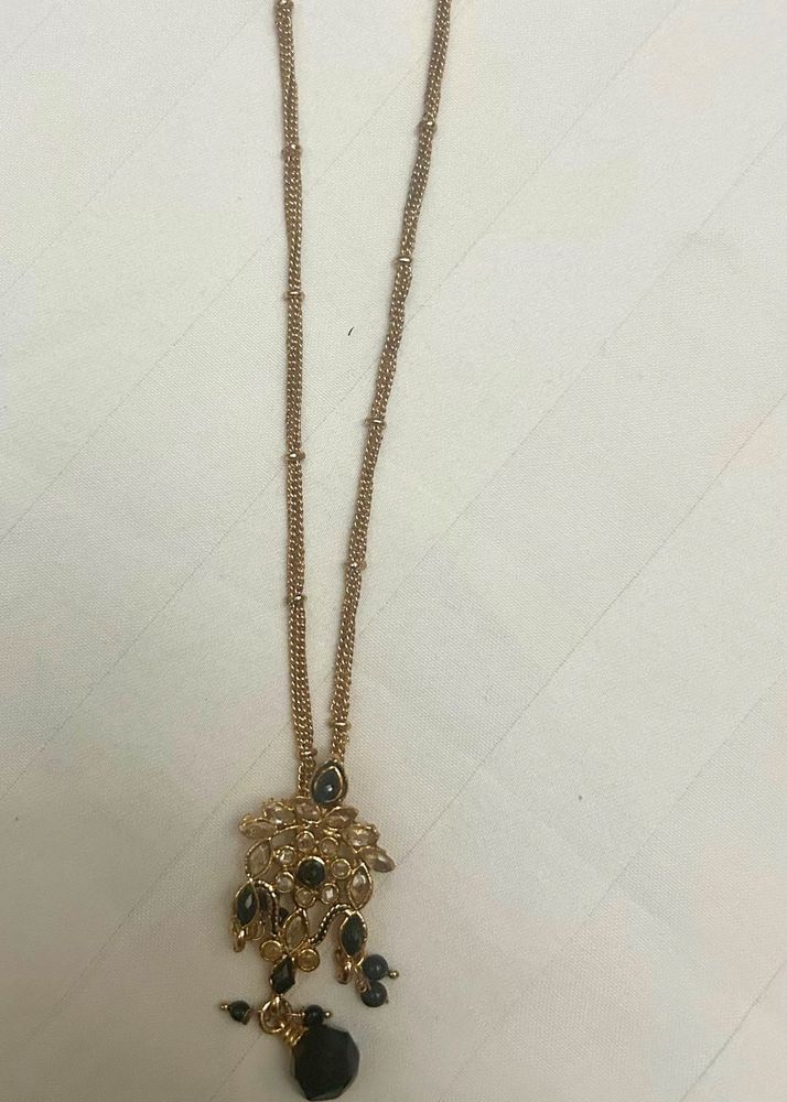 Elegant Gold and Black Necklace