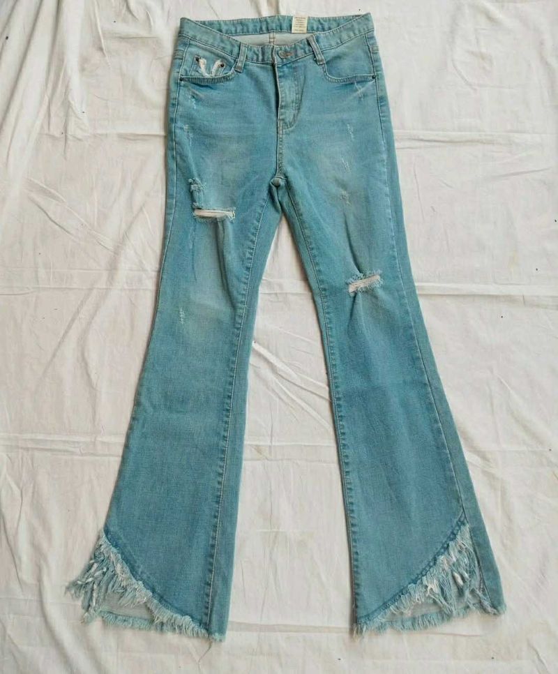 Ripped Fringe Hem Flare Jeans