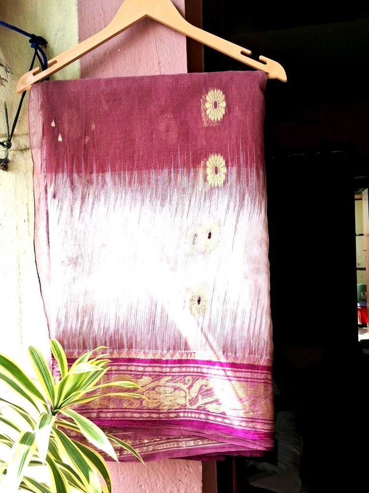 Elegant off white saree with maroon patch