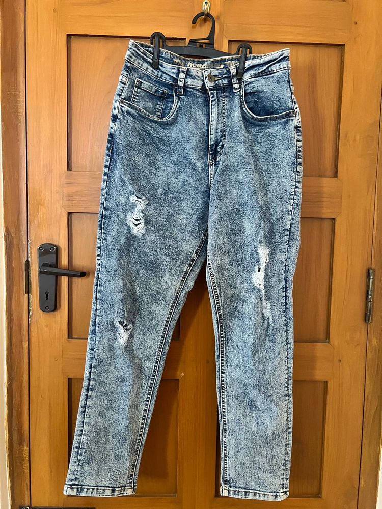 Distressed Blue Denim Jeans