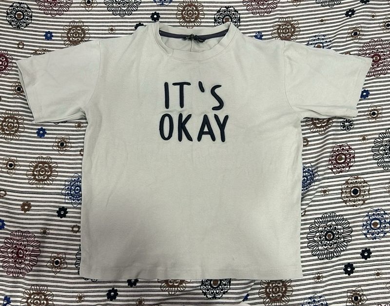 Creme T-Shirt with &#34;It&#39;s Okay”