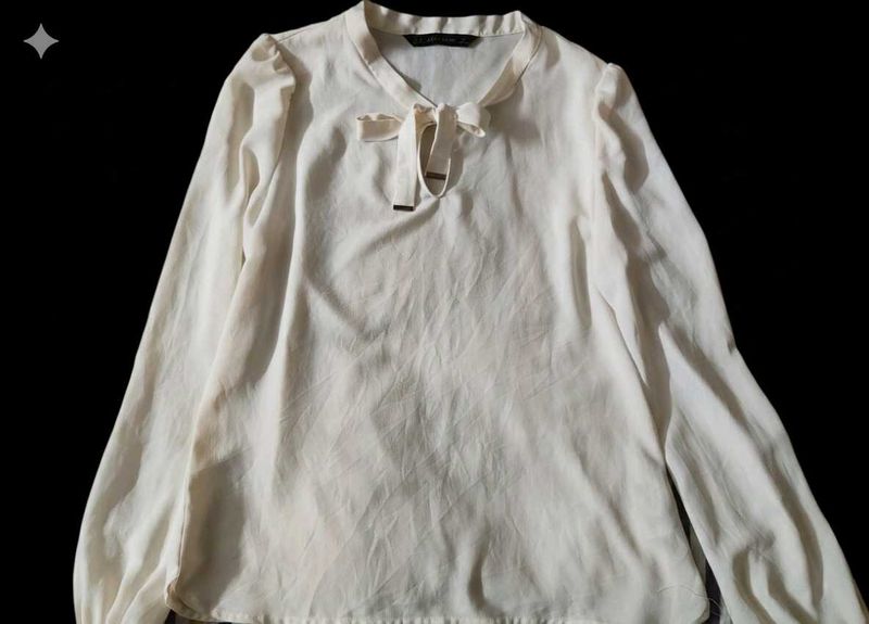 Elegant Cream Blouse with Tie Detail