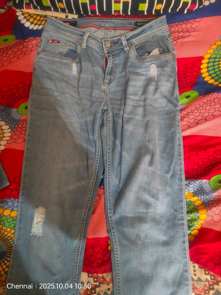 Distressed Denim Jeans