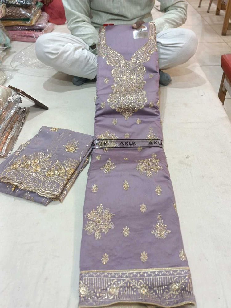 Embroidered dress material