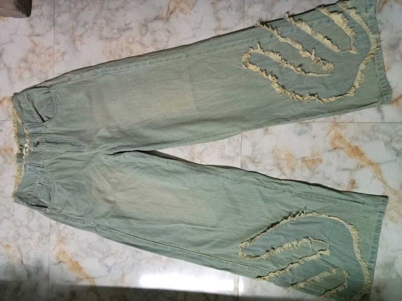 Distressed Wide-Leg Denim Jeans