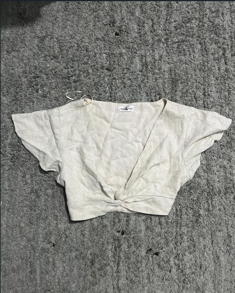 Minx and Moss linen cropped twist knot top